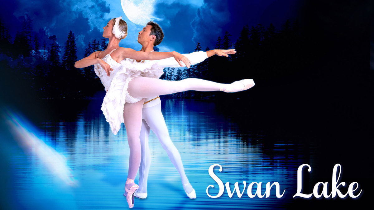 Two ballet dancers in white costumes perform an elegant lift pose at night. A moonlit lake and forest create a serene backdrop. The words Swan Lake are displayed in white text at the bottom right.