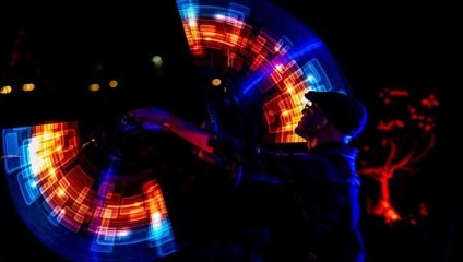 A juggling performer at the Glow light festival 2023