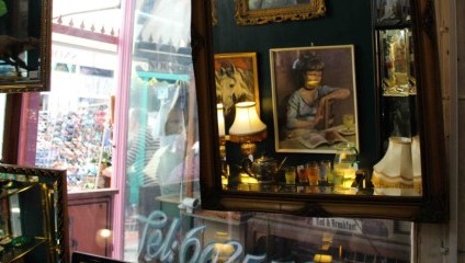 Inside Snoopers Paradise - mirrors, paintings, prints, lamps. Just a tiny corner of the 7000 ft sprawling warehouse.