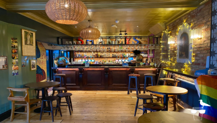 Inside Shakespeare's Head, bar area with fish bowl on the bar