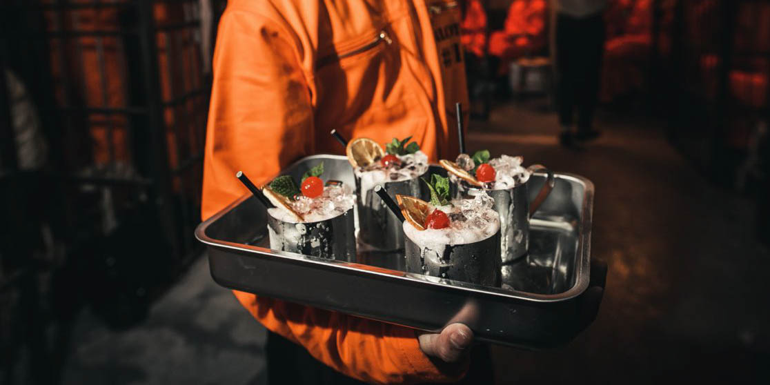 Delicious bespoke cocktails and the iconic orange jumpsuit.