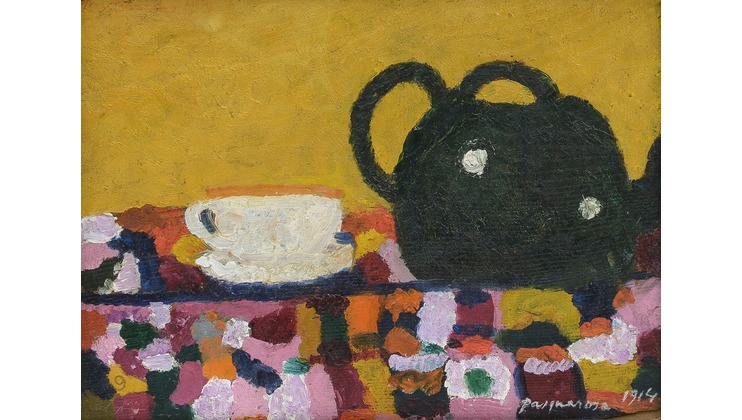 A painting depicts a black teapot next to a white teacup, both set on a vibrantly patterned tablecloth. The background is a rich mustard yellow, adding warmth to the composition. The painting style is abstract with bold, textured brushstrokes.