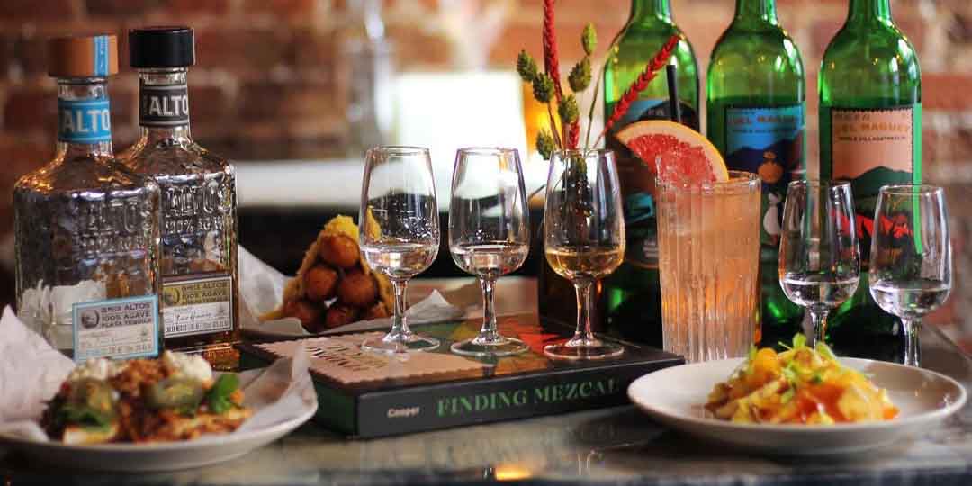 Mezcal tasting flight paired with tasty tapas.