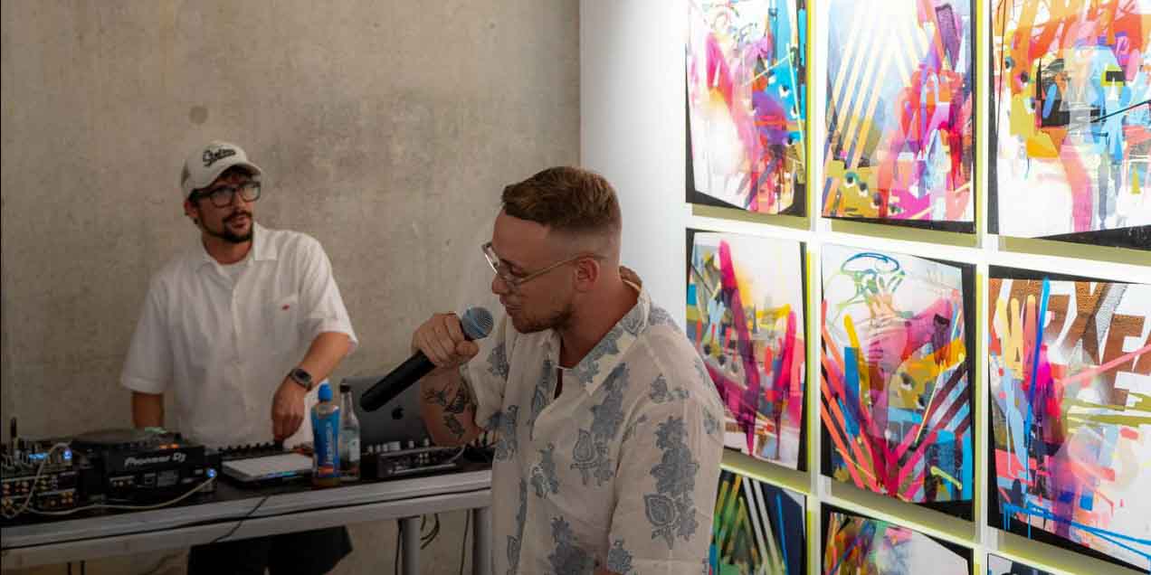 DJ event at Helm Gallery, fusing music and commercial art.