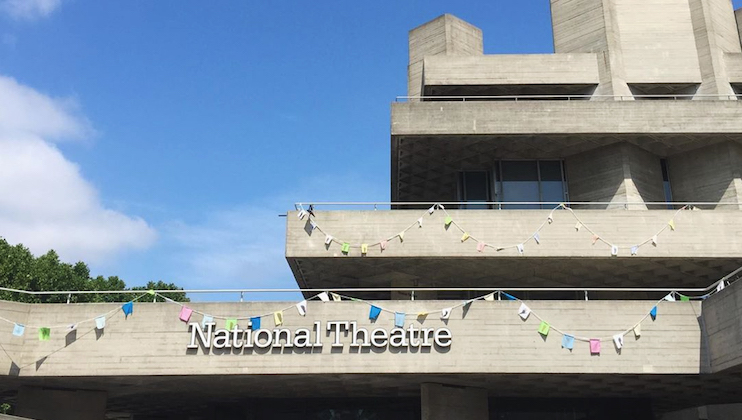 Exterior of National Theatre in London with bunting