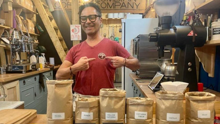 Founder Eduardo Florez proudly displays the logo on his shirt for The Colombian Coffee Co.