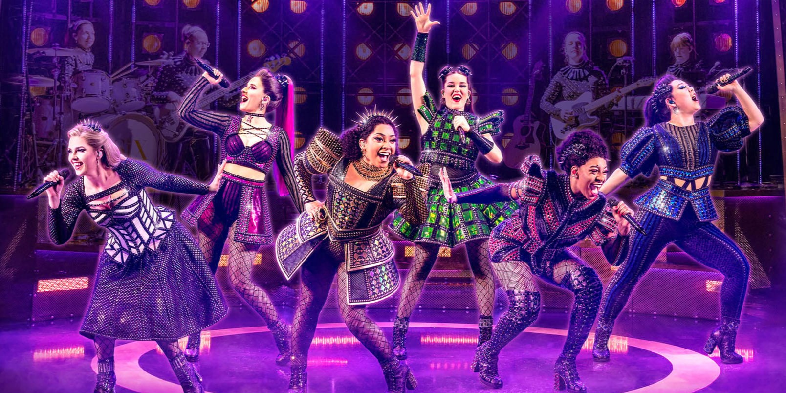 Glitzy promo image of the performers of Six musical singing on stage, backed by musicians.