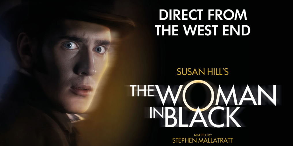 Promotional poster for Stephen Mallatratt's adaption of  Susan Hill's The Woman In Black theatre show at the Theatre Royal Brighton, which has just toured the west end. A young man with piercing blue eyes and Victorian dress stares at the viewer with apprehension.