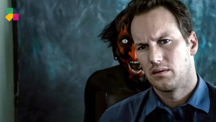 A man with a serious expression sits in the foreground, wearing a blue shirt. Behind him, a sinister, red-faced demon with black hair and glowing eyes peers ominously over his shoulder. The background is dark and eerie, creating a tense and unsettling atmosphere.