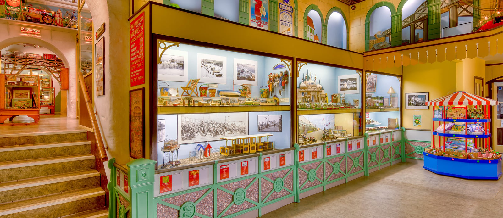 Interior display at Brighton Toy and Model Museum showcasing vintage toys, seaside memorabilia and historic Brighton scenes inside the museum beneath Brighton Station.