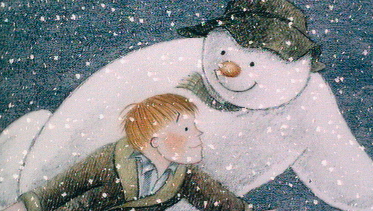 Illustration of a boy and a snowman in a snowy setting. The snowman, wearing a hat, has a carrot nose and a friendly smile, while the boy, dressed in winter clothing, looks up at the snowman with a look of wonder. Snowflakes fall gently around them.
